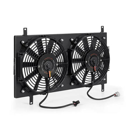 Dual electric radiator fan assembly in Mishimoto aluminum fan shroud kit for Mazda Miata