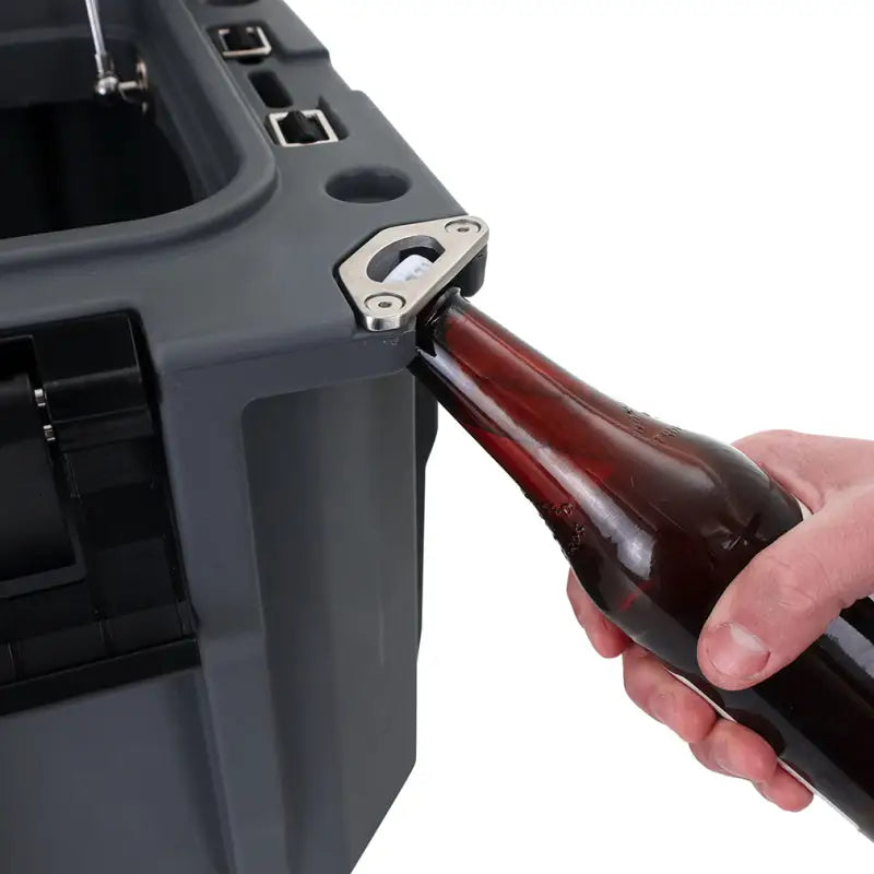 Gray Mishimoto Borne off-road hard case cooler with built-in bottle opener