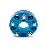 Blue Mishimoto Borne off-road wheel spacers with bolts for 5x127 wheels