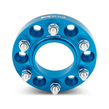 Blue Mishimoto Borne wheel spacers with bolts for 5x150 hub bore upgrade