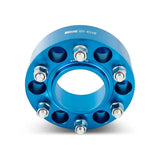Blue Mishimoto Borne Off-Road Wheel Spacers with bolts for 5x150 vehicles