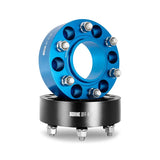 Blue and black Mishimoto Borne Off-Road Wheel Spacers for increased vehicle clearance