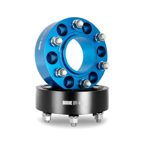 Blue and black Mishimoto Borne off-road wheel spacers for 6x139.7 fit