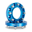 Blue Mishimoto Borne wheel spacers for 8x165.1 vehicle upgrade in blue color