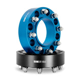 Blue and black Mishimoto Borne off-road wheel spacers for 8X165.1 121.3 50 M14 wheels