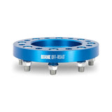 Blue Mishimoto Borne off-road wheel spacers with studs for maximum fit and style