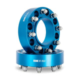 Blue Mishimoto Borne off-road wheel spacers with studs for enhanced fitment
