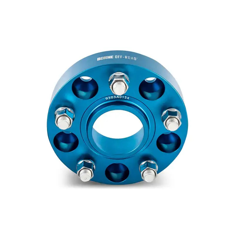 Blue Mishimoto Borne off-road wheel spacers with bolts for improved fitment