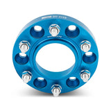 Blue Mishimoto Borne road wheel spacers with bolts for off-road wheels