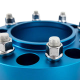 Blue Mishimoto Borne wheel spacers with lug nuts for off-road road wheel spacers