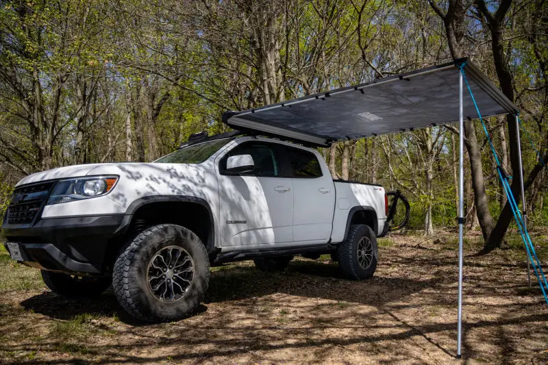 White Chevrolet Colorado with Mishimoto Borne Rooftop Awning 93in L x 118in D Grey