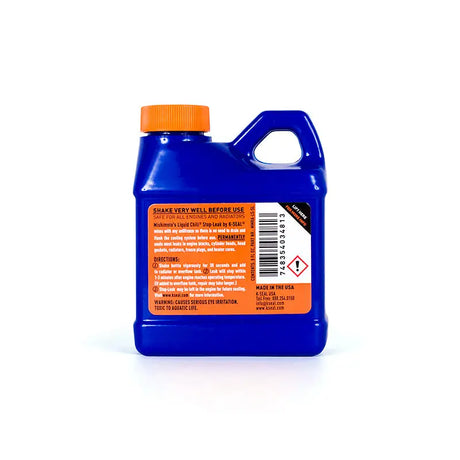 Blue bottle with orange cap of Mishimoto Liquid Chill Stop-Leak 8oz for cooling