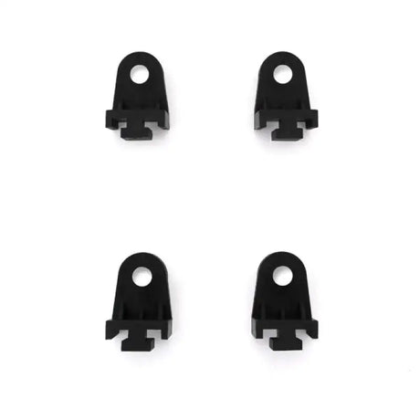 Four Mishimoto plastic fan clips for easy cooling system installation