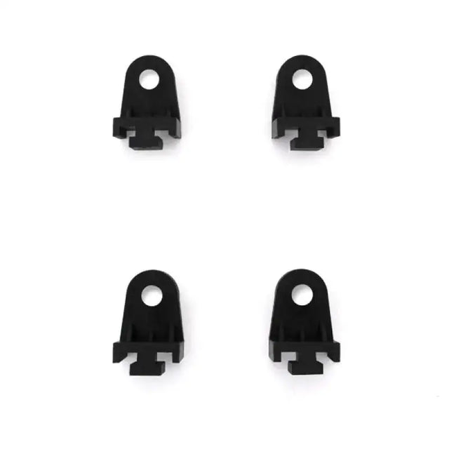 Four Mishimoto plastic fan clips for easy cooling system installation
