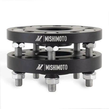 Black wheel spacers with bolts from Mishimoto Tesla Wheel Spacer Staggered Bundle 15mm + 20mm