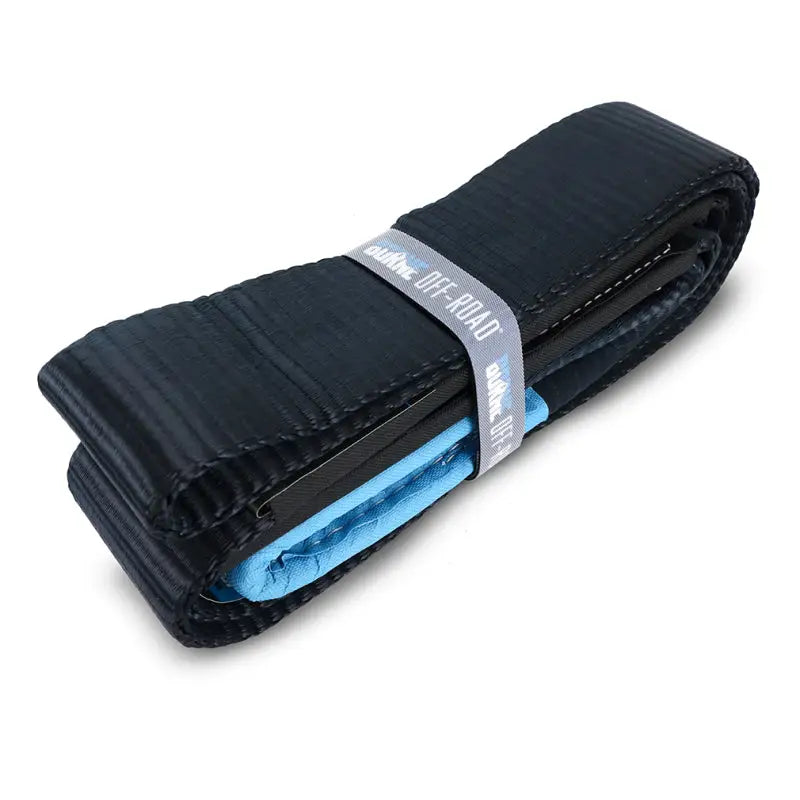 Folded black Mishimoto Tree Saver 3x8 recovery strap for safe tree rescue