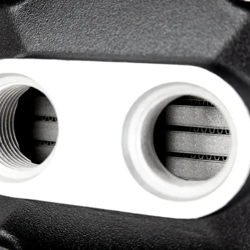 Close-up of Mishimoto intercooler dual pass with threaded inlet for high performance cooling