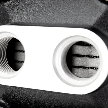 Close-up of Mishimoto intercooler dual pass with threaded inlet for high performance cooling