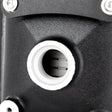 Black metal part with white-rimmed hole from Mishimoto Universal Air-to-Water Intercooler