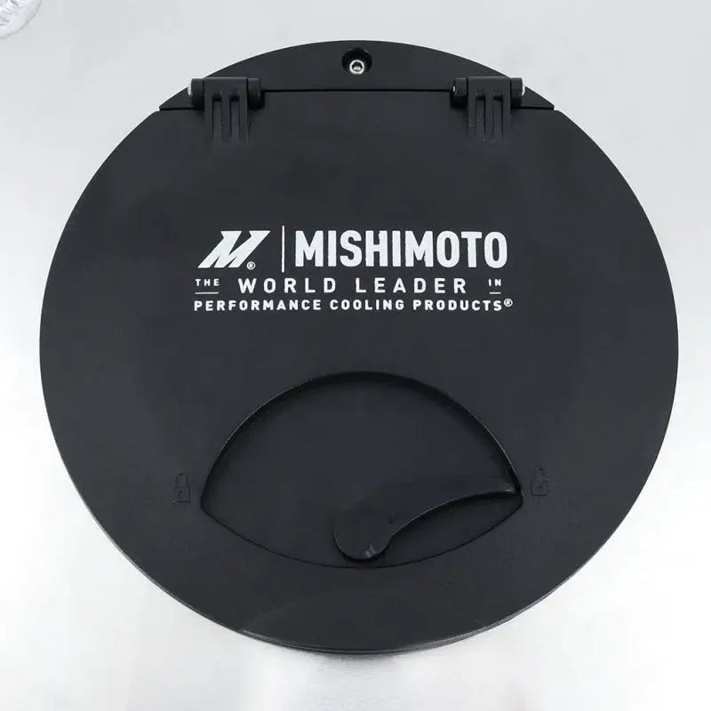 Black Mishimoto radiator cap on Mishimoto Universal Ice Box Tank Reservoir 2.5 Gallon