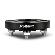 Black mishimoto wheel spacers with studs for 4x100 wheels and M12 bolts