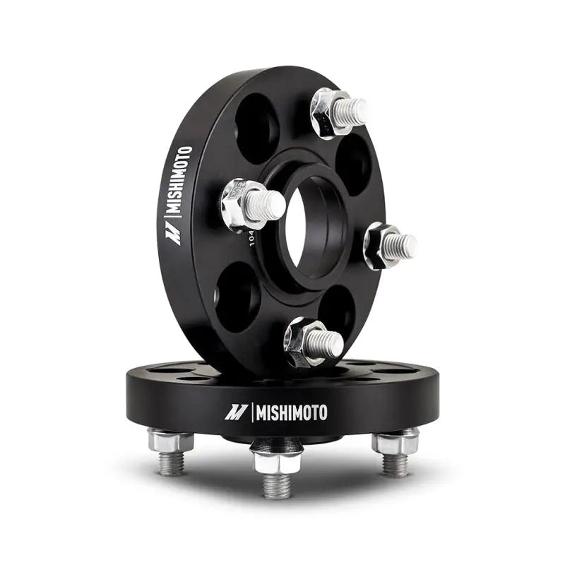 Black Mishimoto wheel spacers with bolts for 4x100 rims and M12 fitment