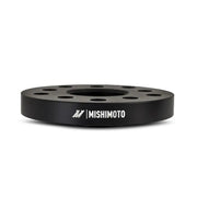 Black Mishimoto Wheel Spacers for 5x112 wheels enhancing fit and style