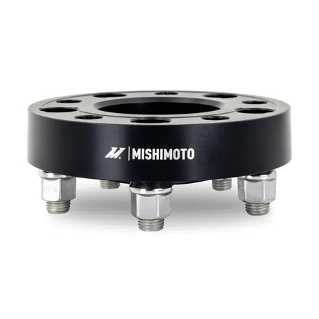 Black mishimoto wheel spacers with silver studs for 5x114.3 fit and 25mm width