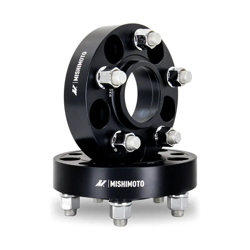 Black Mishimoto wheel spacers with silver studs for 5x114.3 bolt pattern fit