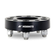 Black Mishimoto Wheel Spacers with studs for 5x114.3 fitment and M12 bolts