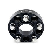 Black Mishimoto Wheel Spacers with silver bolts for improved fitment and style