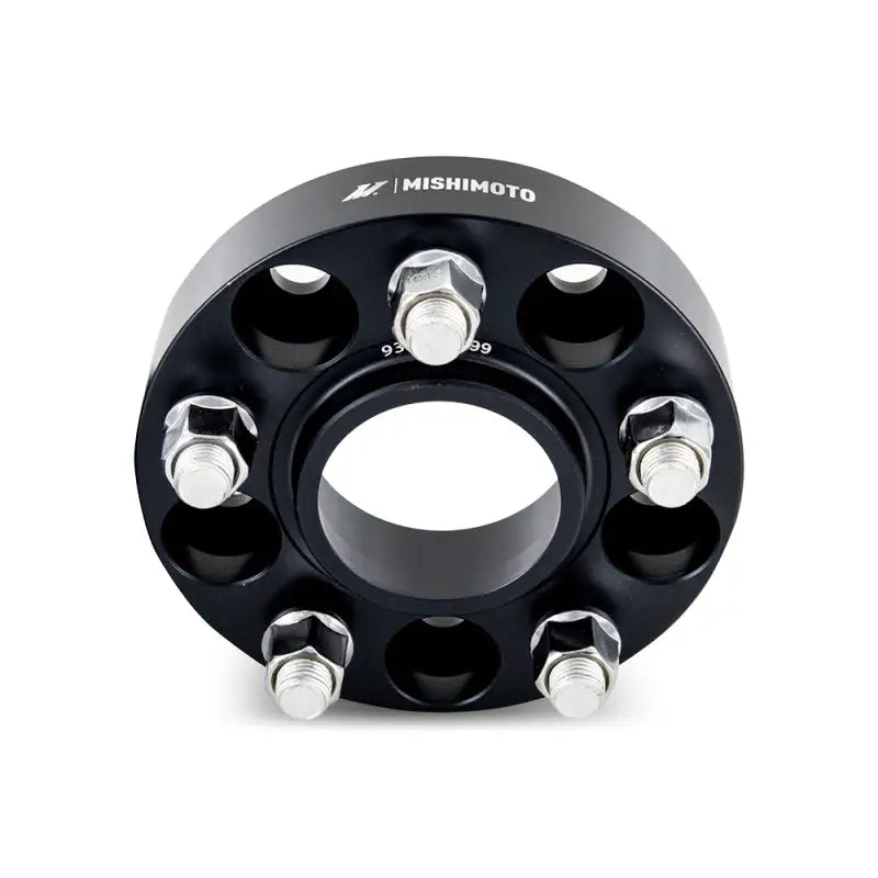 Black Mishimoto Wheel Spacers with silver bolts for improved fit and style