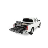 White pickup truck with MN4 Decked bed storage for easy access on Nissan Frontier 2015+