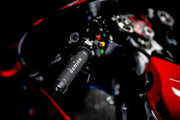 Black and grey Motogp grips on a motorcycle handlebar, dimpled pattern, medium-firm inner, and soft outer compound, designed for competition, 22mm handlebars, open ends, 125mm length, RV, Automotive, Powersports, off-road, marine, exterior, truck accessories, interior, truck bed, RV parts, AVADA - Best Sellers