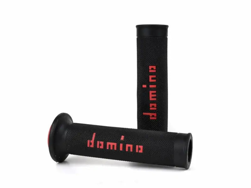 Pair of Motogp black/red grips designed for road race competition featuring a dual thermoplastic compound system and a comfortable dimpled pattern by Domino.
