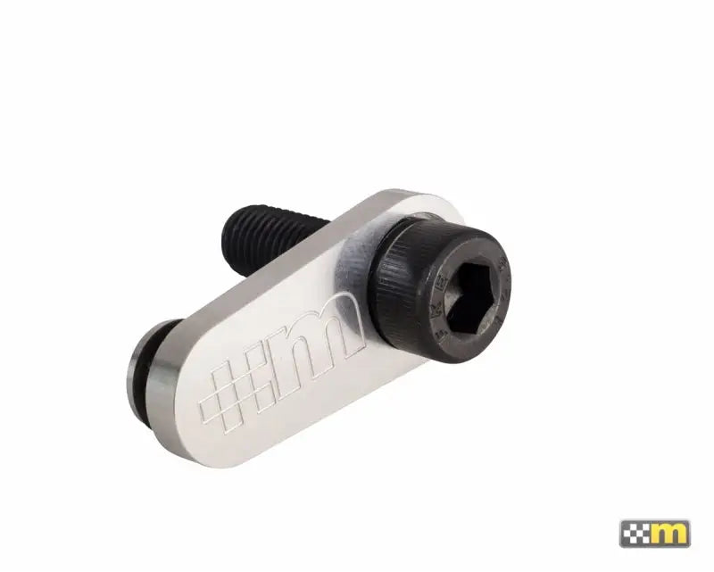 Silver metal bracket with black bolts for mountune Balance Shaft Delete Kit