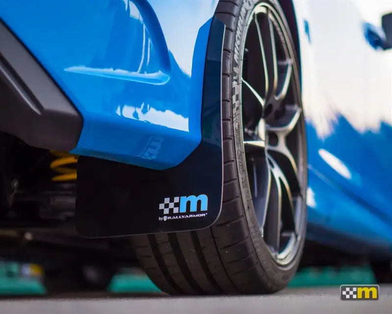 Blue Ford Focus rally armor mud flap set for off-road protection