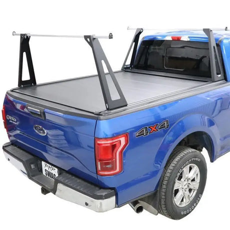 Blue pickup truck with bed rack.