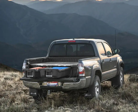 Gray pickup truck with MT6 Decked storage system in a Toyota Tacoma 2004+
