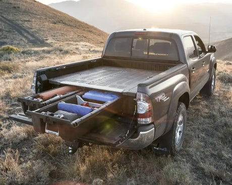Gray pickup truck with open bed drawers on MT6 Decked Toyota Tacoma 2004+
