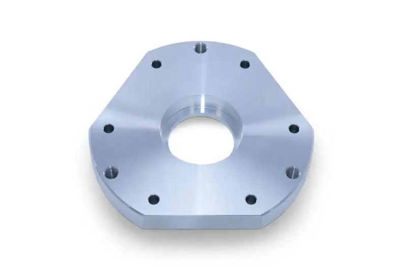 Silver metal mounting plate with holes for multi tool clutch service kit