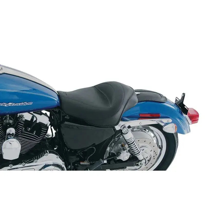 Blue Harley Sportster with black touring solo seat for comfortable rides