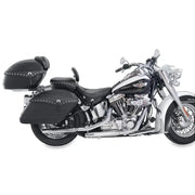Black and white Harley Softail with wide tire and studded leather passenger seat