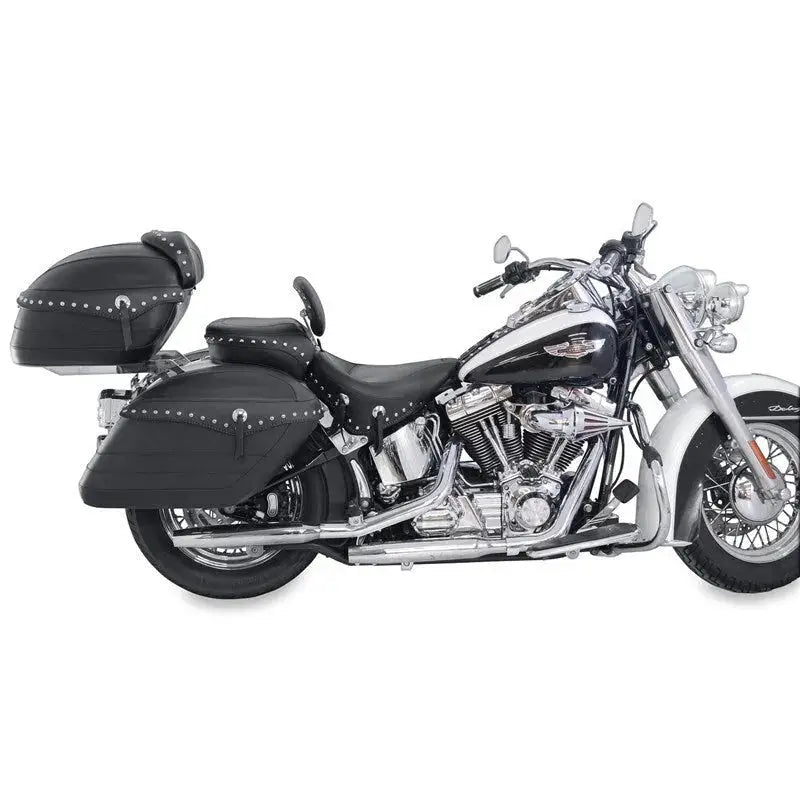 Black and white Harley Softail with wide tire and studded leather passenger seat