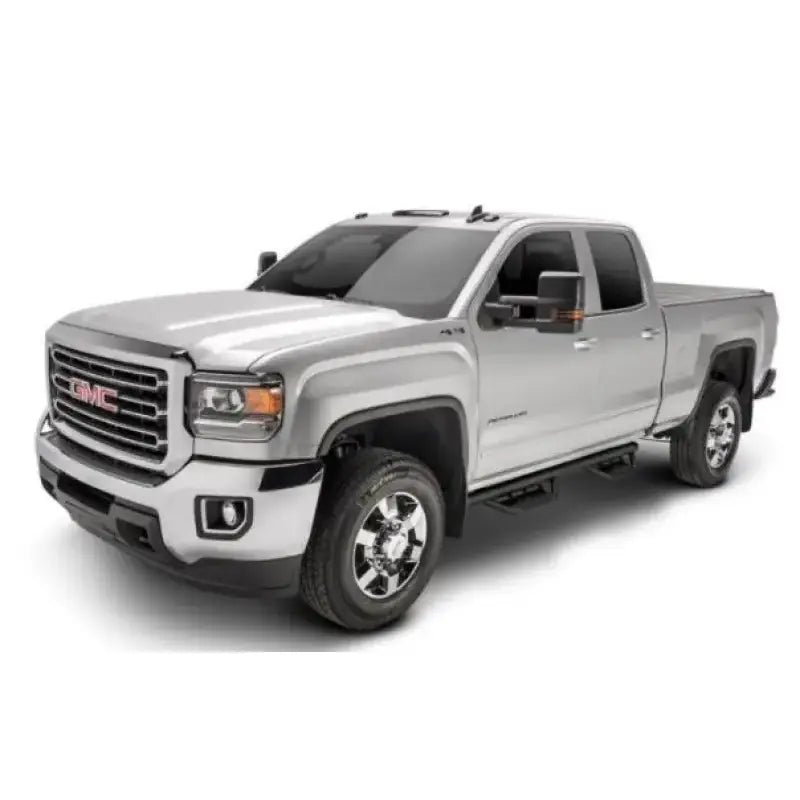 Silver GMC pickup truck with matte black stainless nerf bar and drop down steps