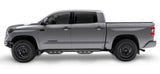 Gray Toyota Tundra with matte black stainless steel nerf bar and drop down steps