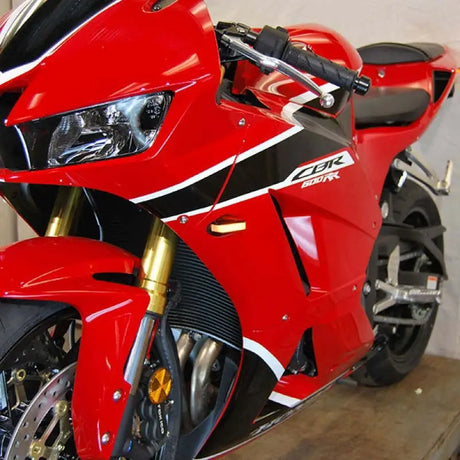 Red and black CBR 600RR motorcycle with Rage Cycles LED turn signals