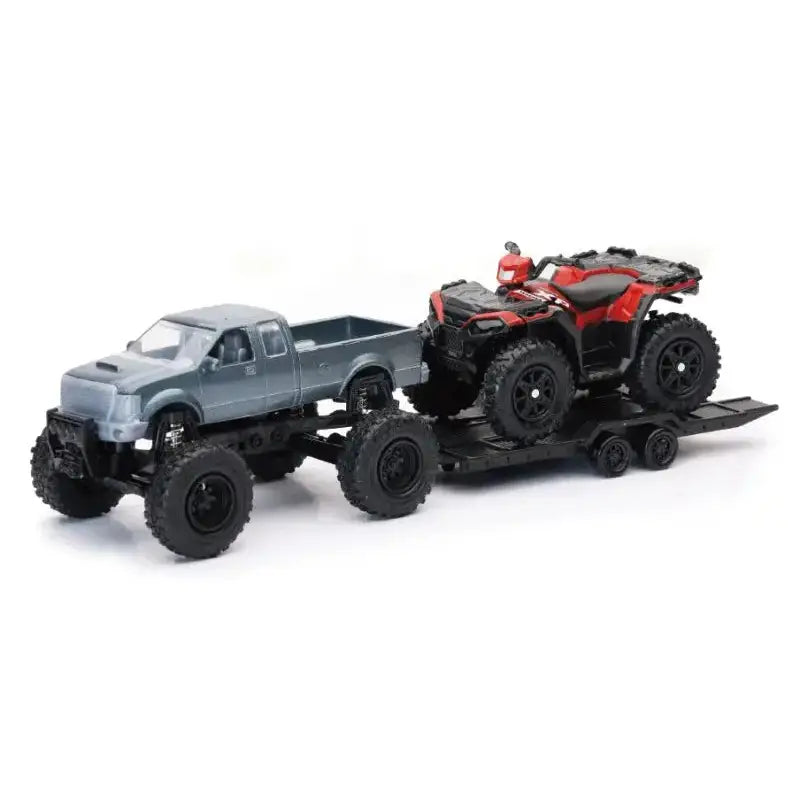 Toy truck hauling ATV on trailer with Polaris Sportsman XP1000 offroad pickup display