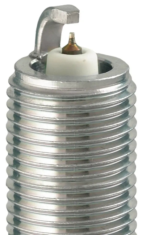 Close-up of NGK Iridium Spark Plug for high performance, durability, and fuel efficiency.