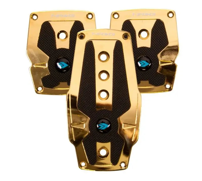 Three gold and black snowboard binding plates with rubber inserts for NRG Aluminum Sport Pedal